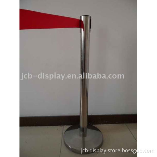 polished stainless steel post with red belt queue barrier